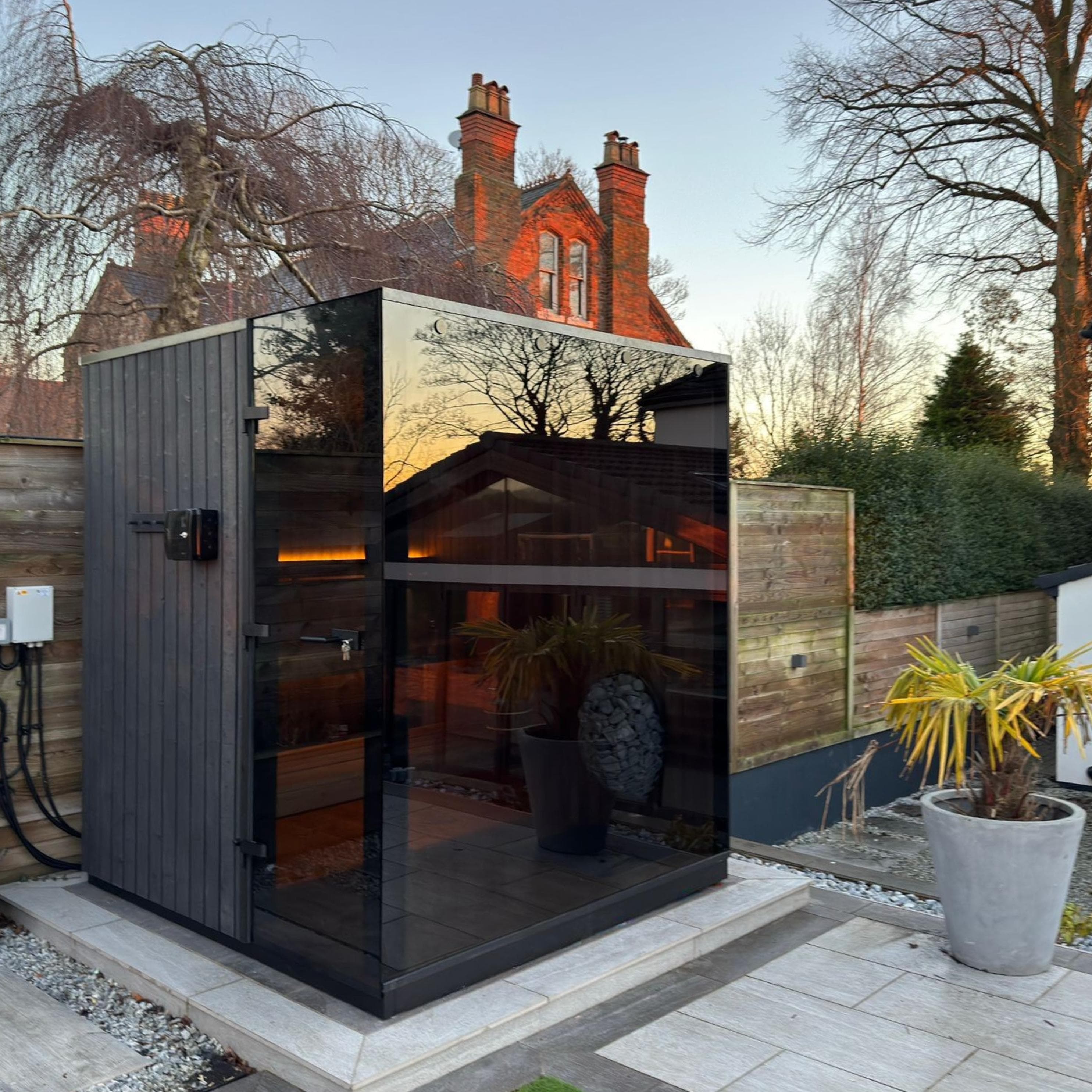 Luxury outdoor panoramic cube sauna exterior