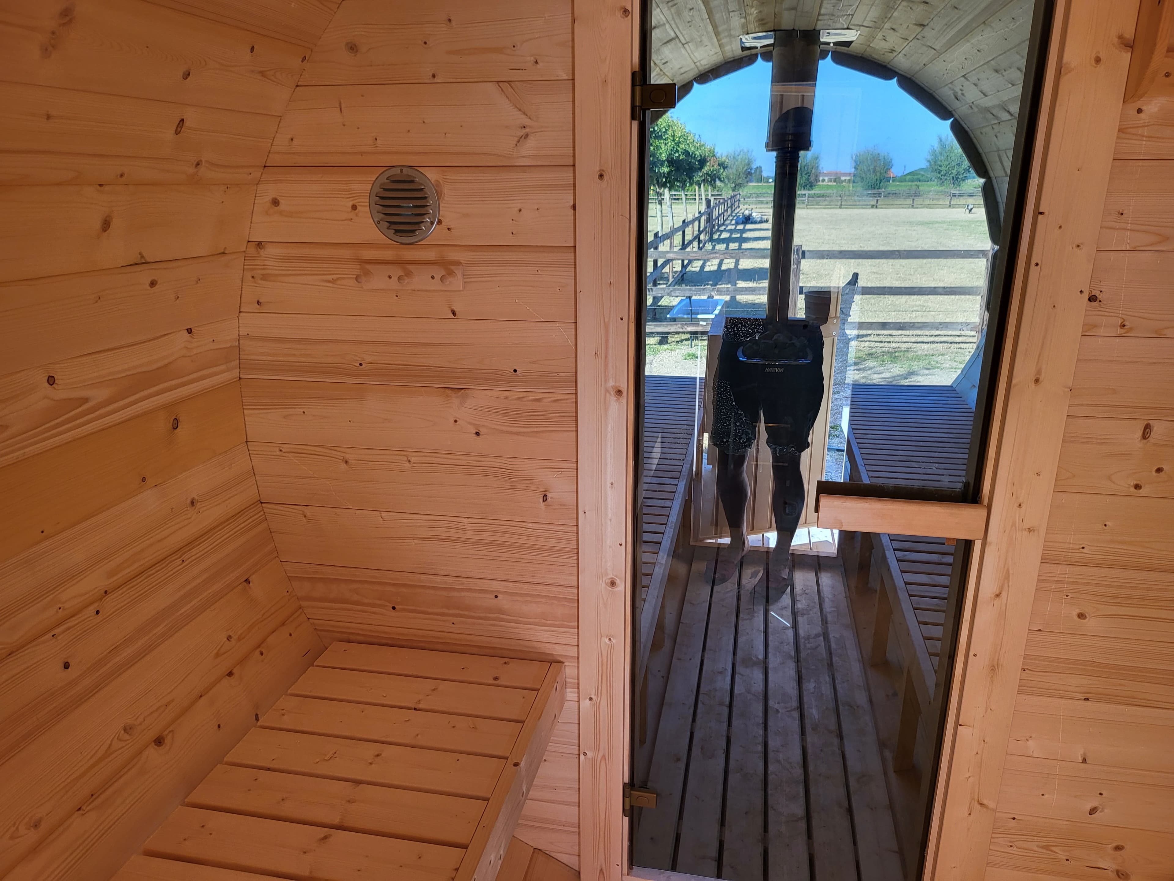Luxury outdoor barrel sauna at a premium European vacation rental property