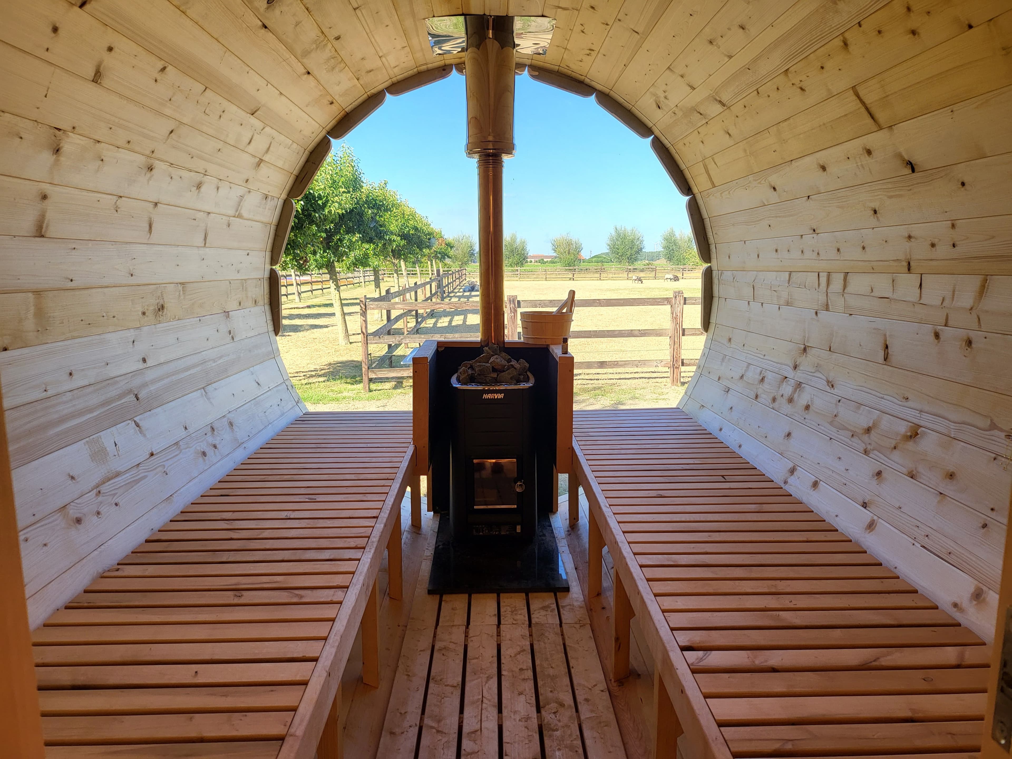 Wood-fired barrel sauna for outdoor home use