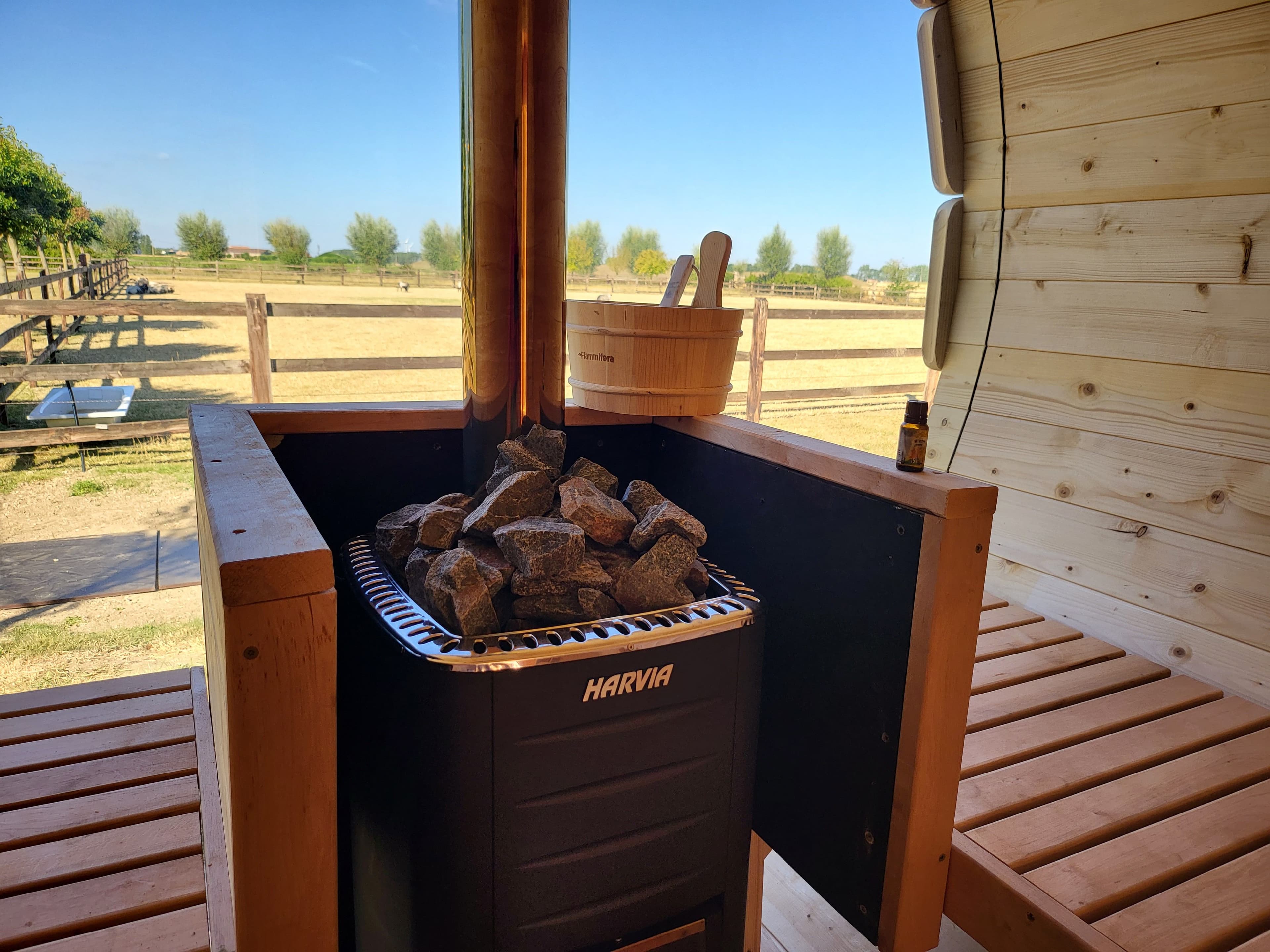 Four-person barrel sauna with changing room